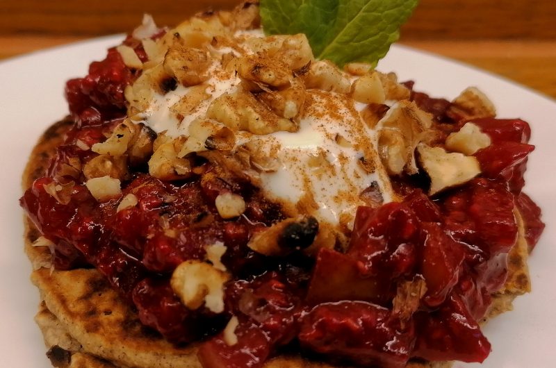 Oat pancakes with raspberry & pear compote and toasted walnuts