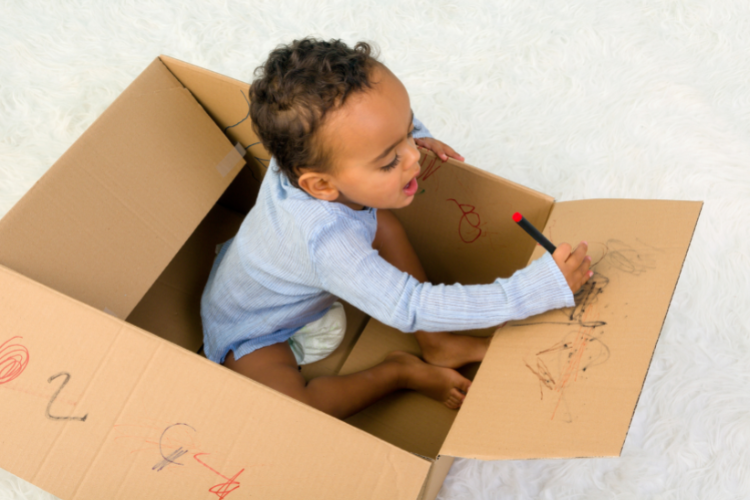 Ball games 2 toddler playing in a box