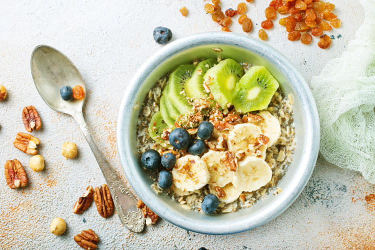 2 bowl of oats with kiwi blueberries and banana
