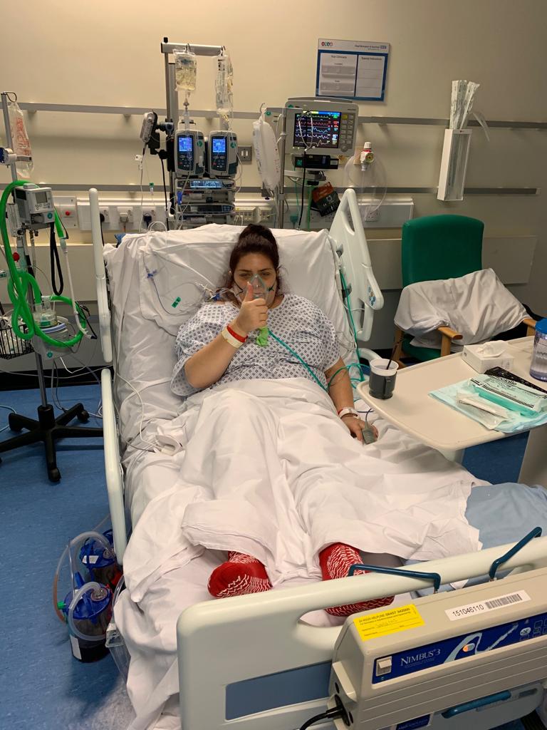 Keeley Hellyer 2 Keeley Hellyer in hospital bed, posing with thumbs up