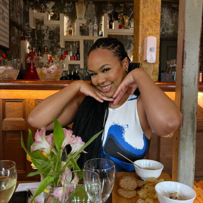Omobolaji Okenla 3 Omobolaji Okenla posing in restaurant smiling
