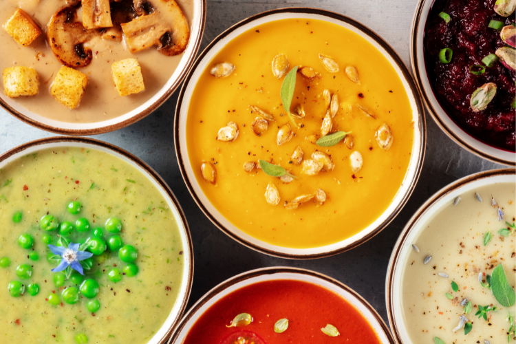 bowls with different kinds of colourful soup