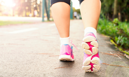 Close up of person's legs running
