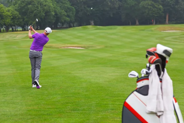 Man playing golf